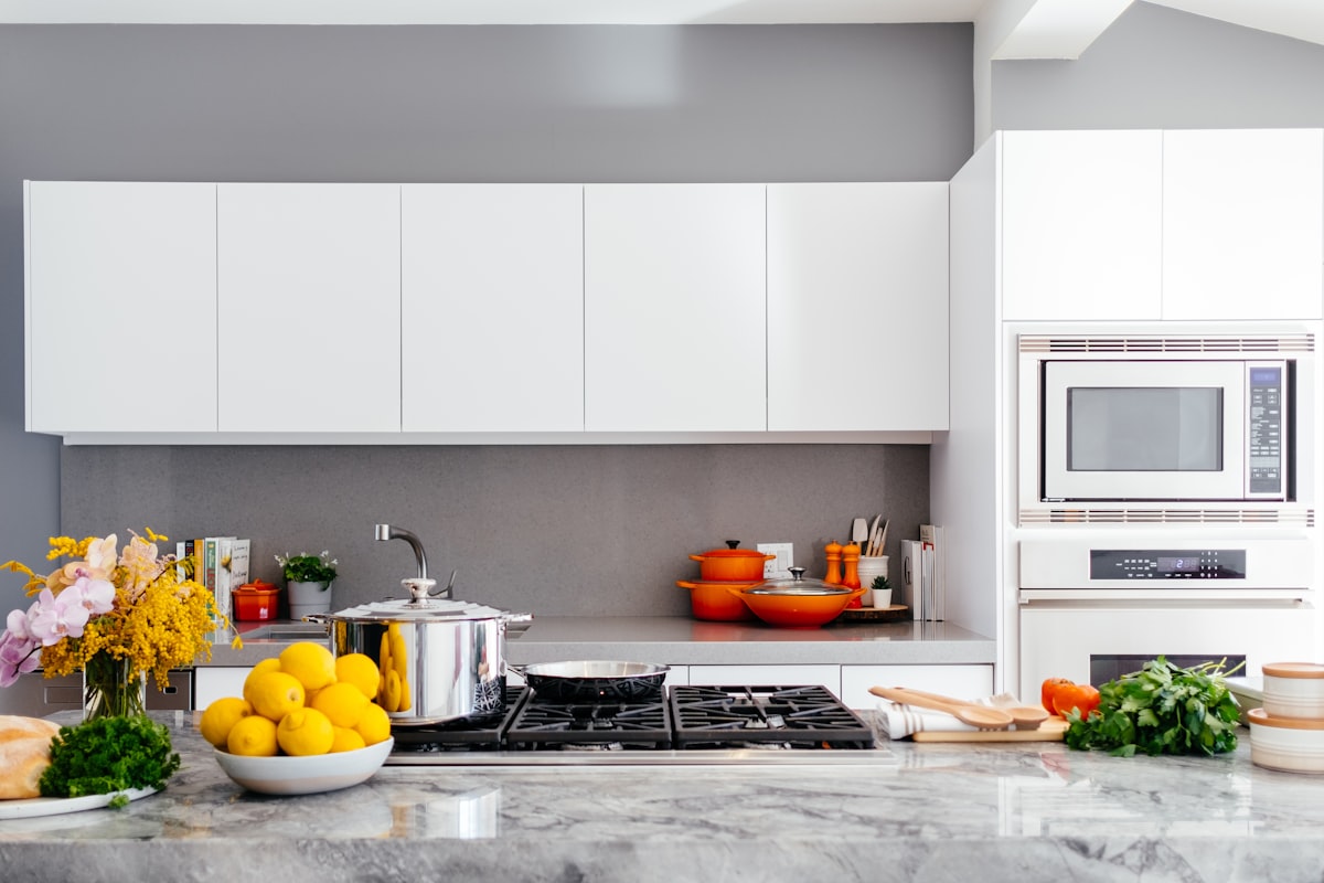 Warm lamp light over a kitchen table at evening